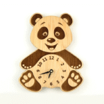 Wooden wall clock shaped like a smiling panda on a white wall